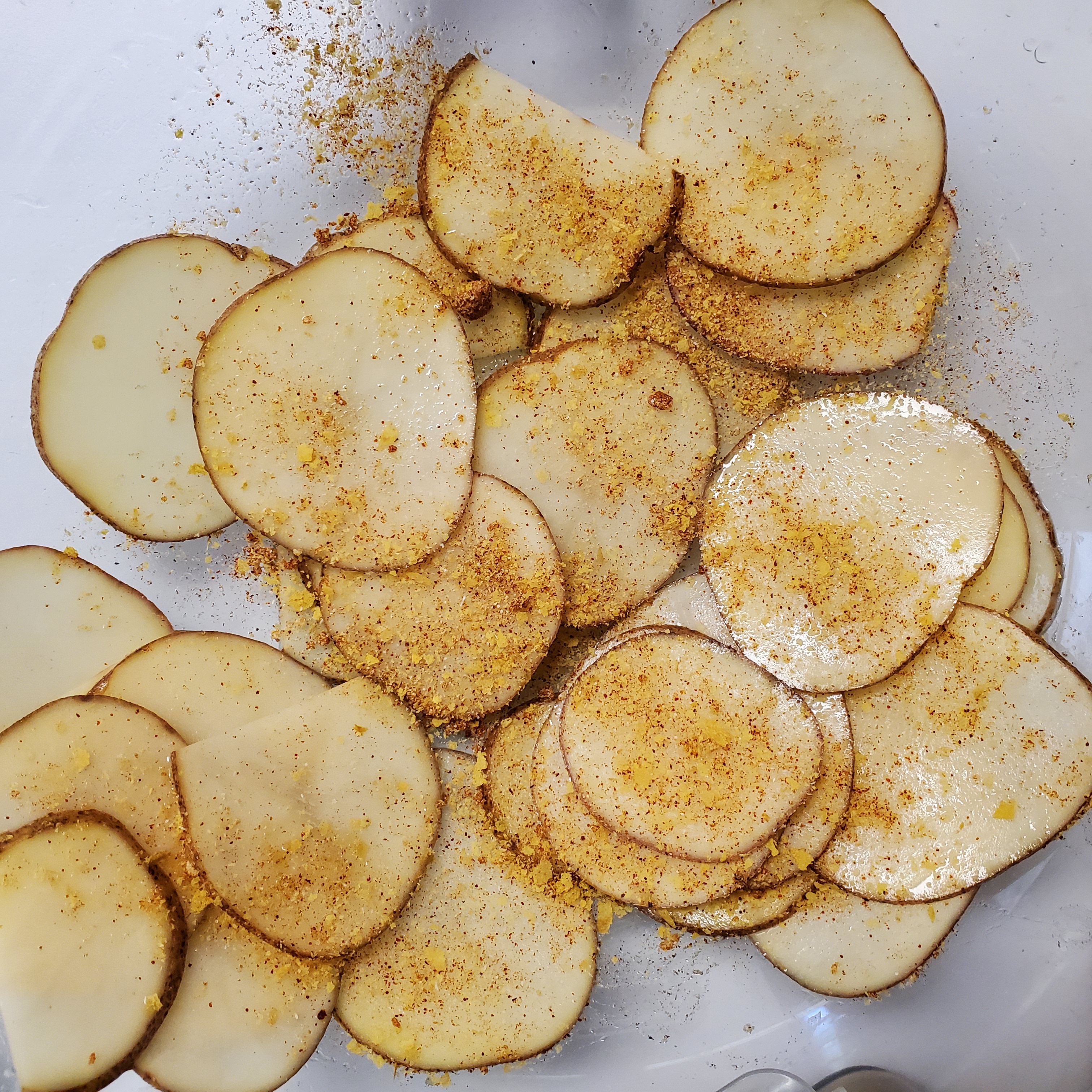 sliced potatoes with homemade bbq seasoning sprinkled on them