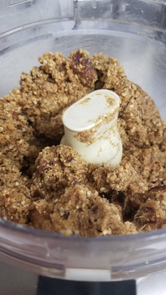 Food processor - showing the ingredients all ground up and ready to be rolled into 'energy bites'