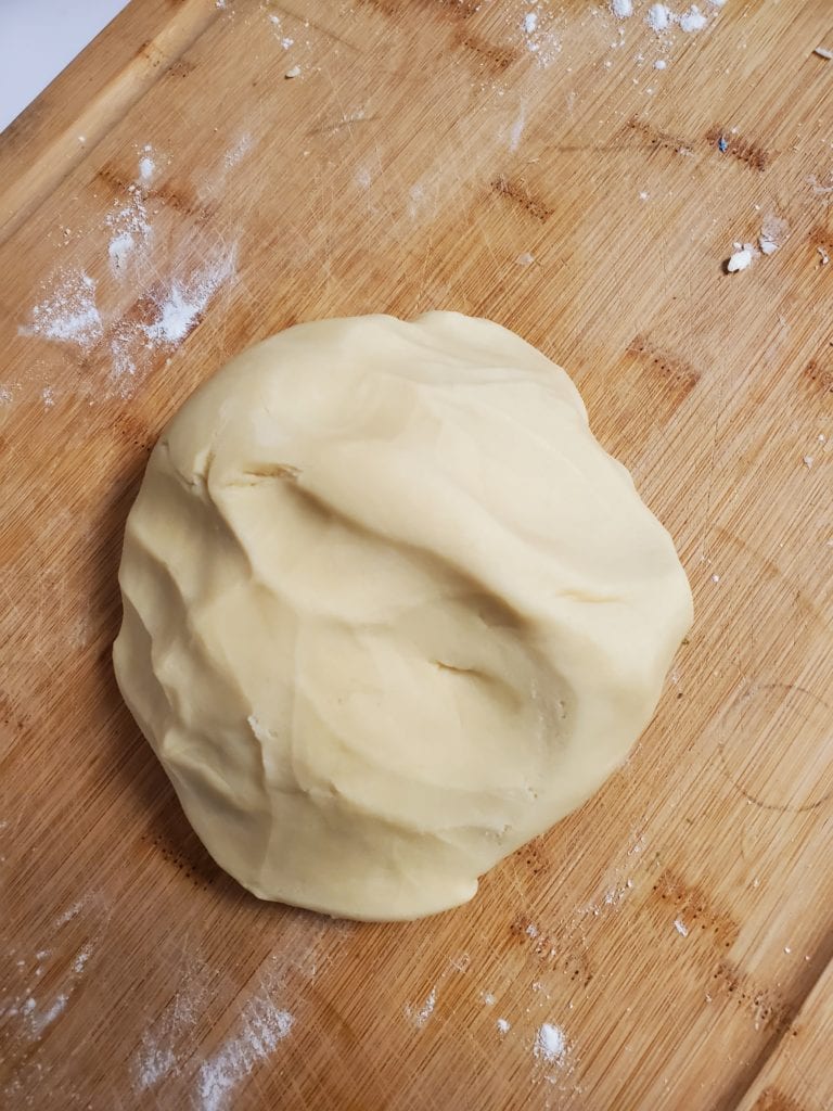 pie dough on a cutting board