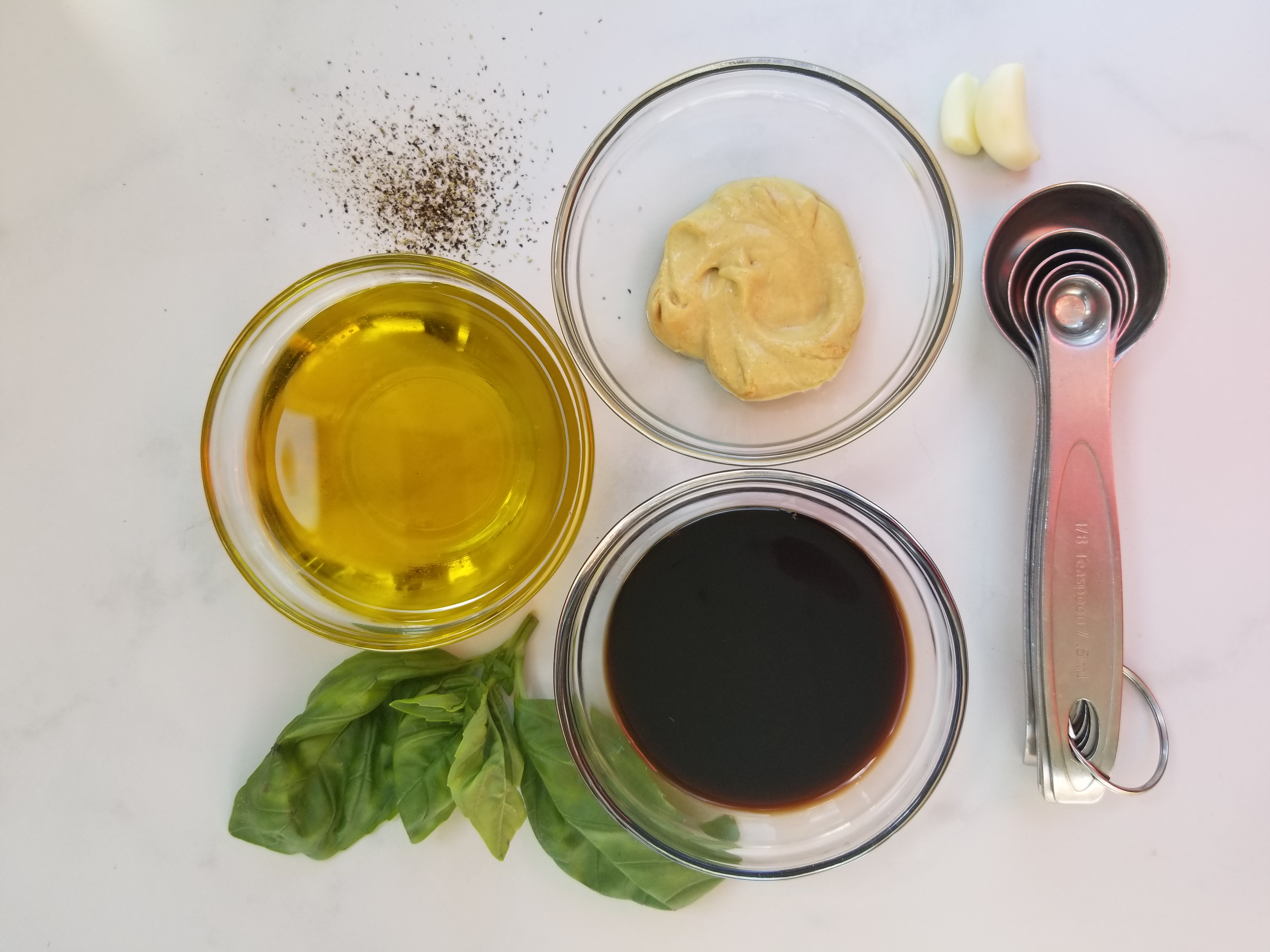 olive oil, balsamic vinegar, dijon mustard, garlic, and basil