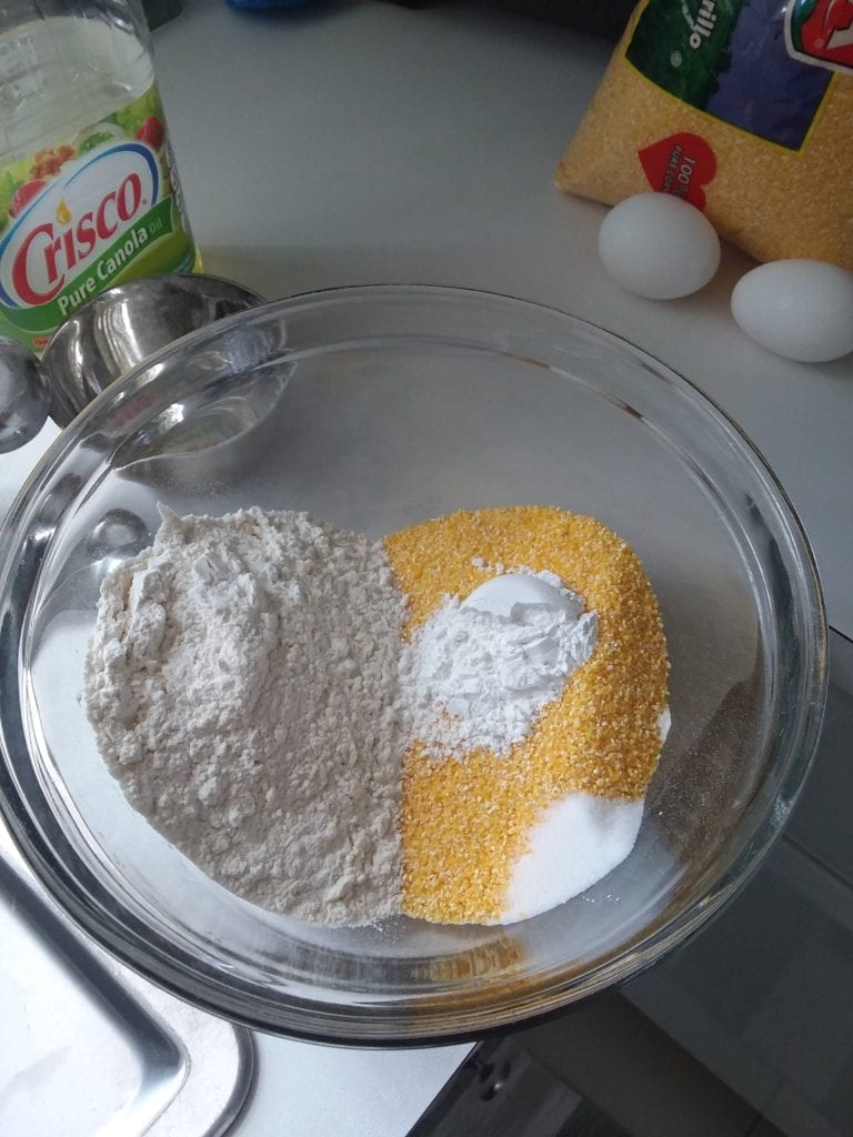 bowl with flour, cornmeal, baking soda and salt