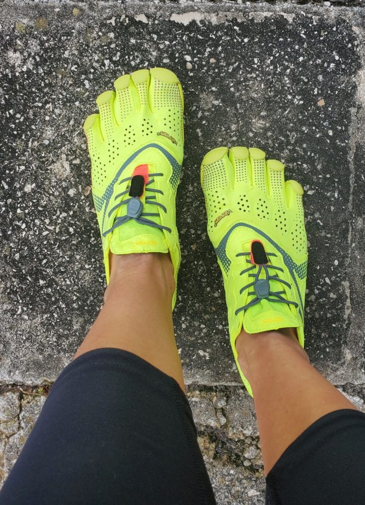 five finger running shoes in neon yellow