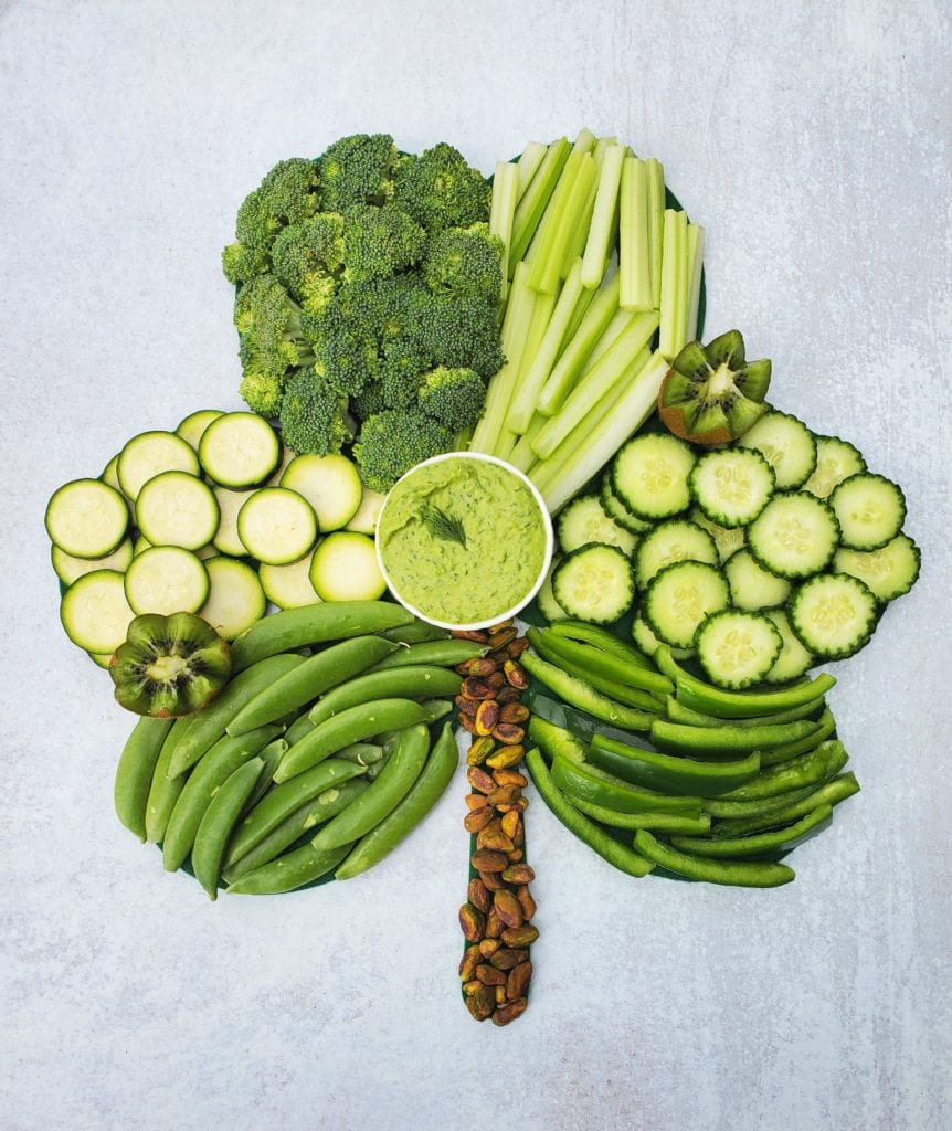All green veggie board in the shape of a shamrock