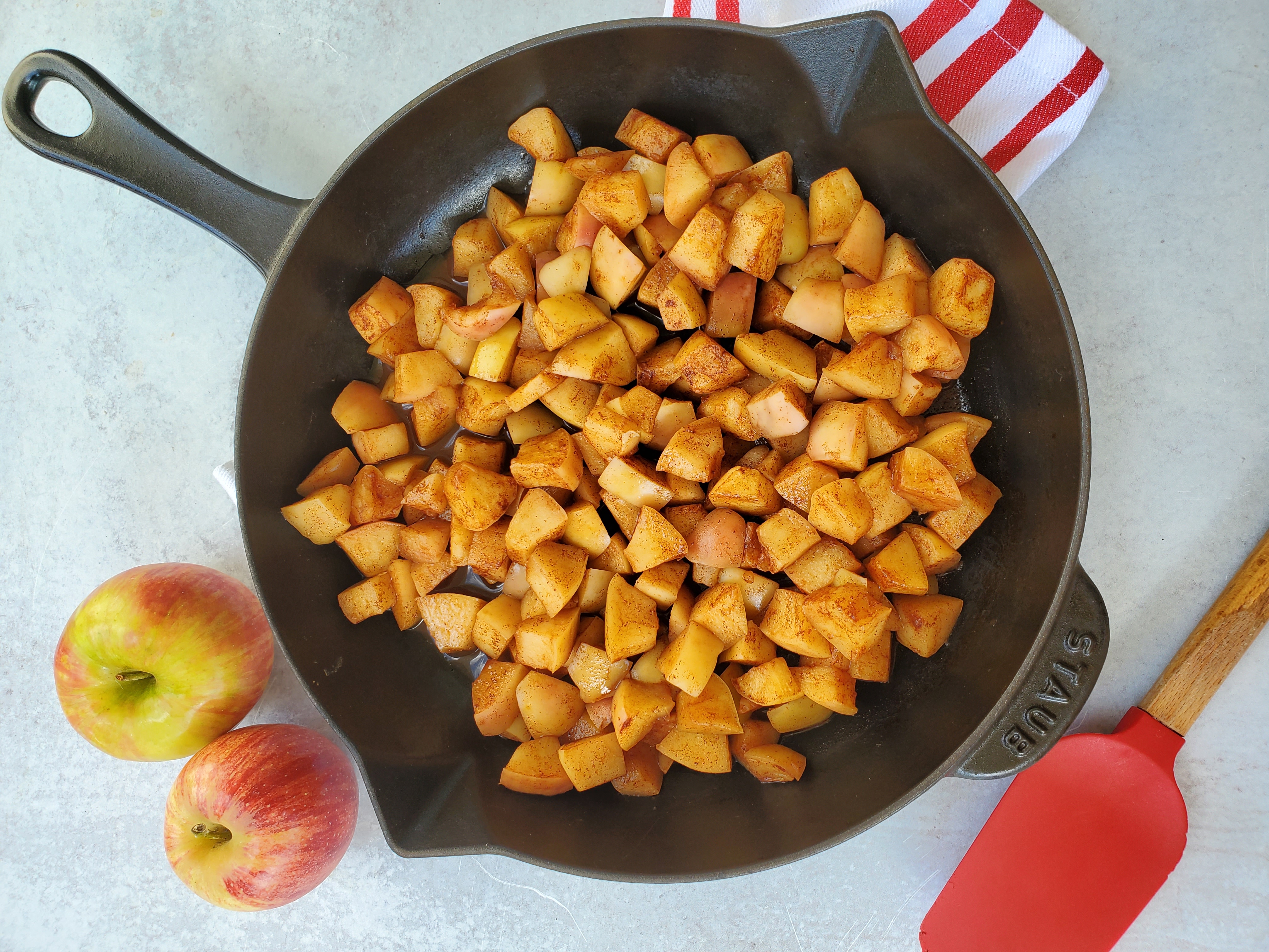 Cinnamon Skillet Apples with towel and apples
