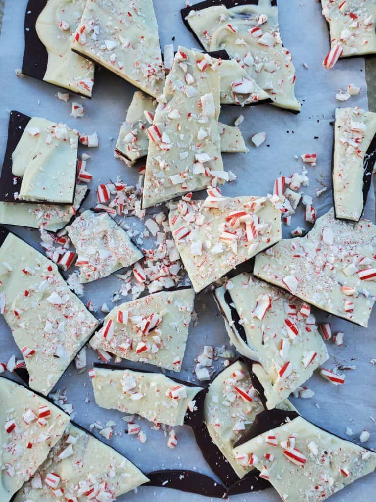 Peppermint Bark in broken pieces on a sheet pan