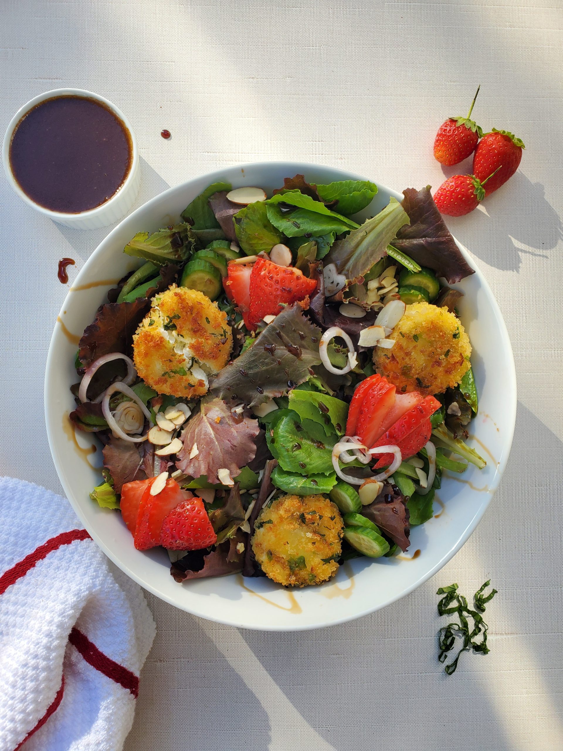 Fried Goat Cheese and Strawberry Salad in a bowl