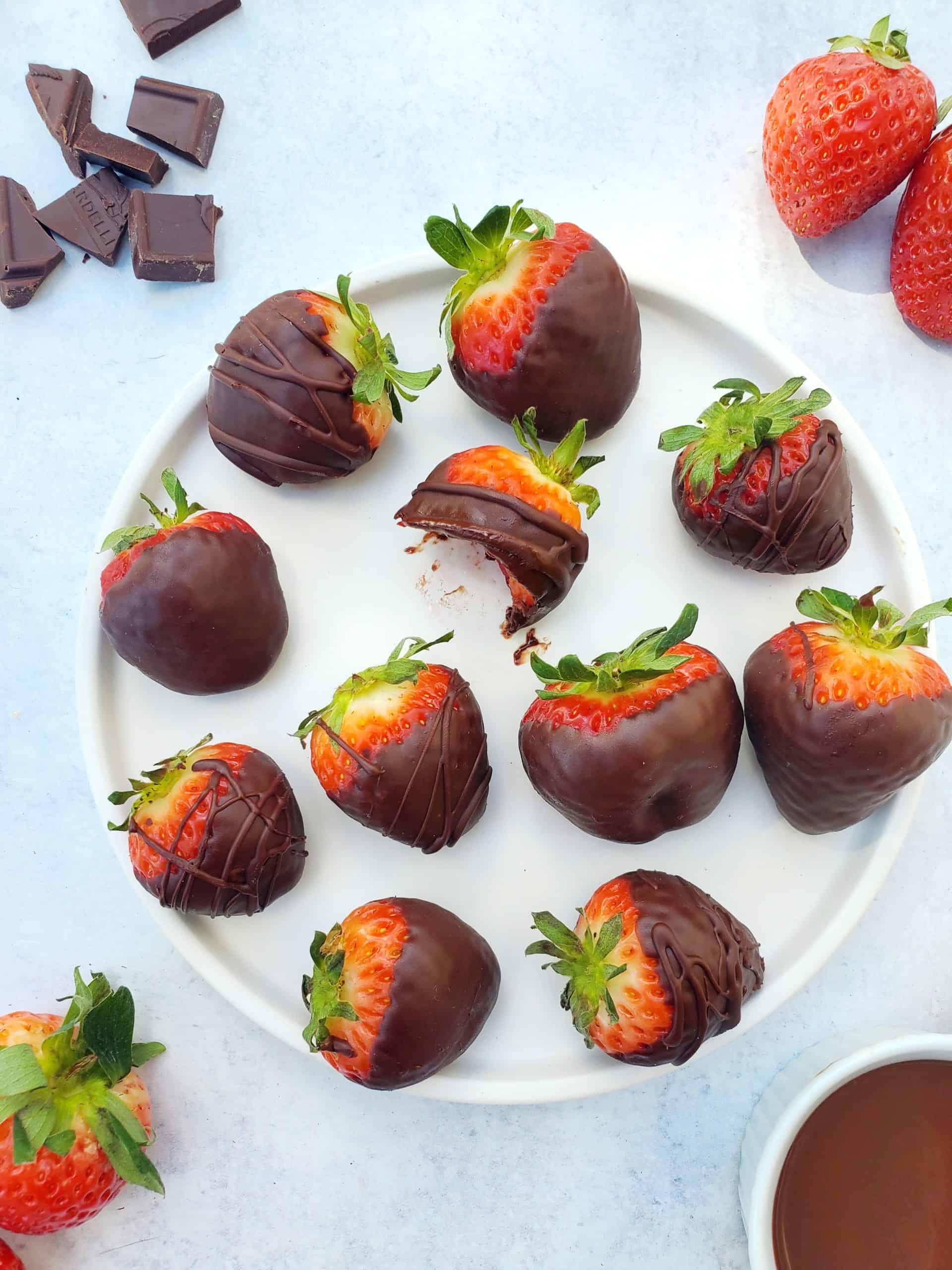 Chocolate Covered Strawberries on a plate with chocolate melted