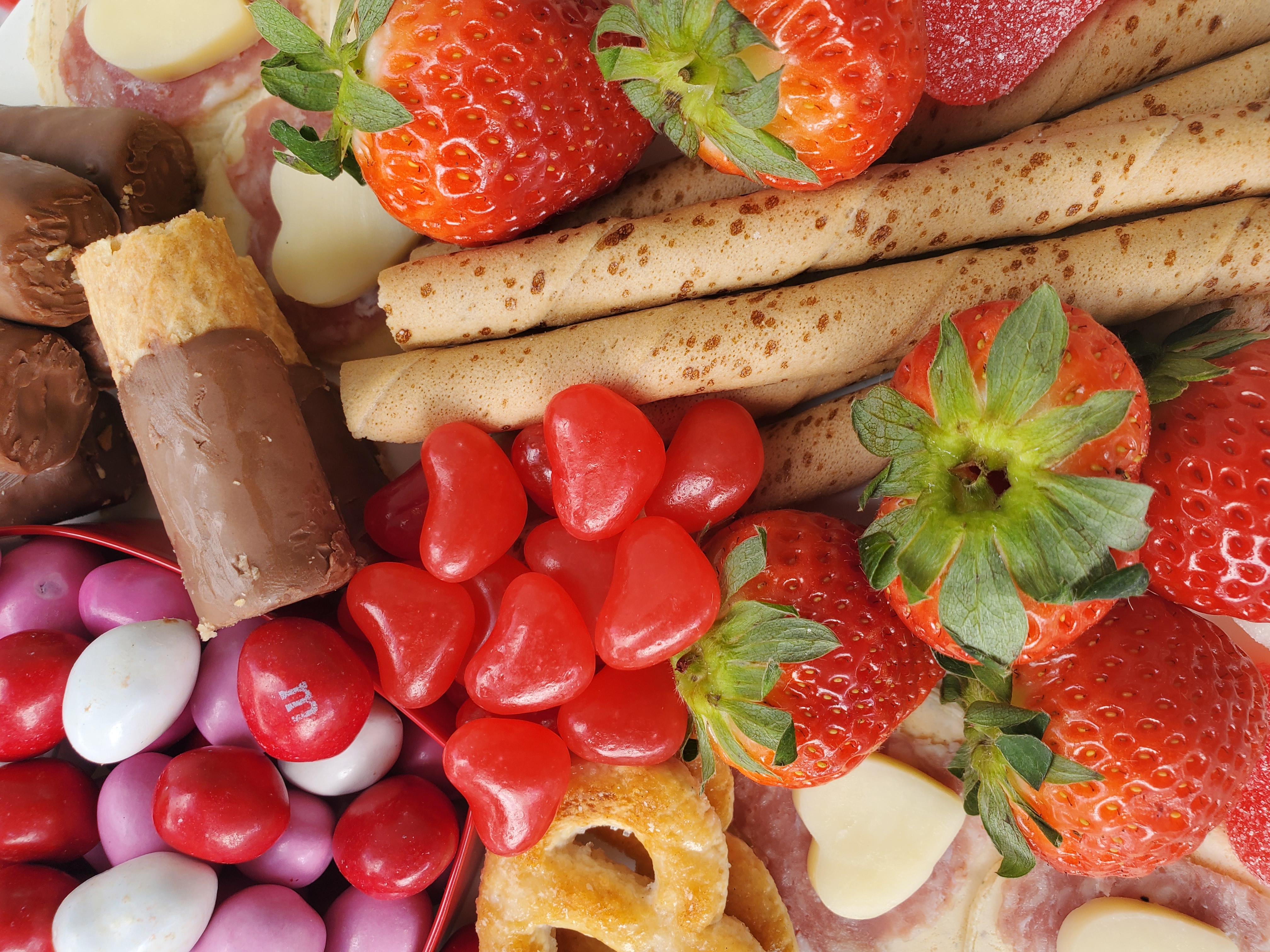 Close-up of a dessert board with candy and cookies