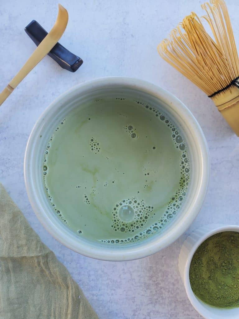 Iced Matcha Latte in whisked bowl