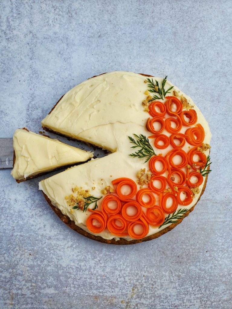 Single Layer Carrot Cake with Cream Cheese Frosting with carrot curls for decoration