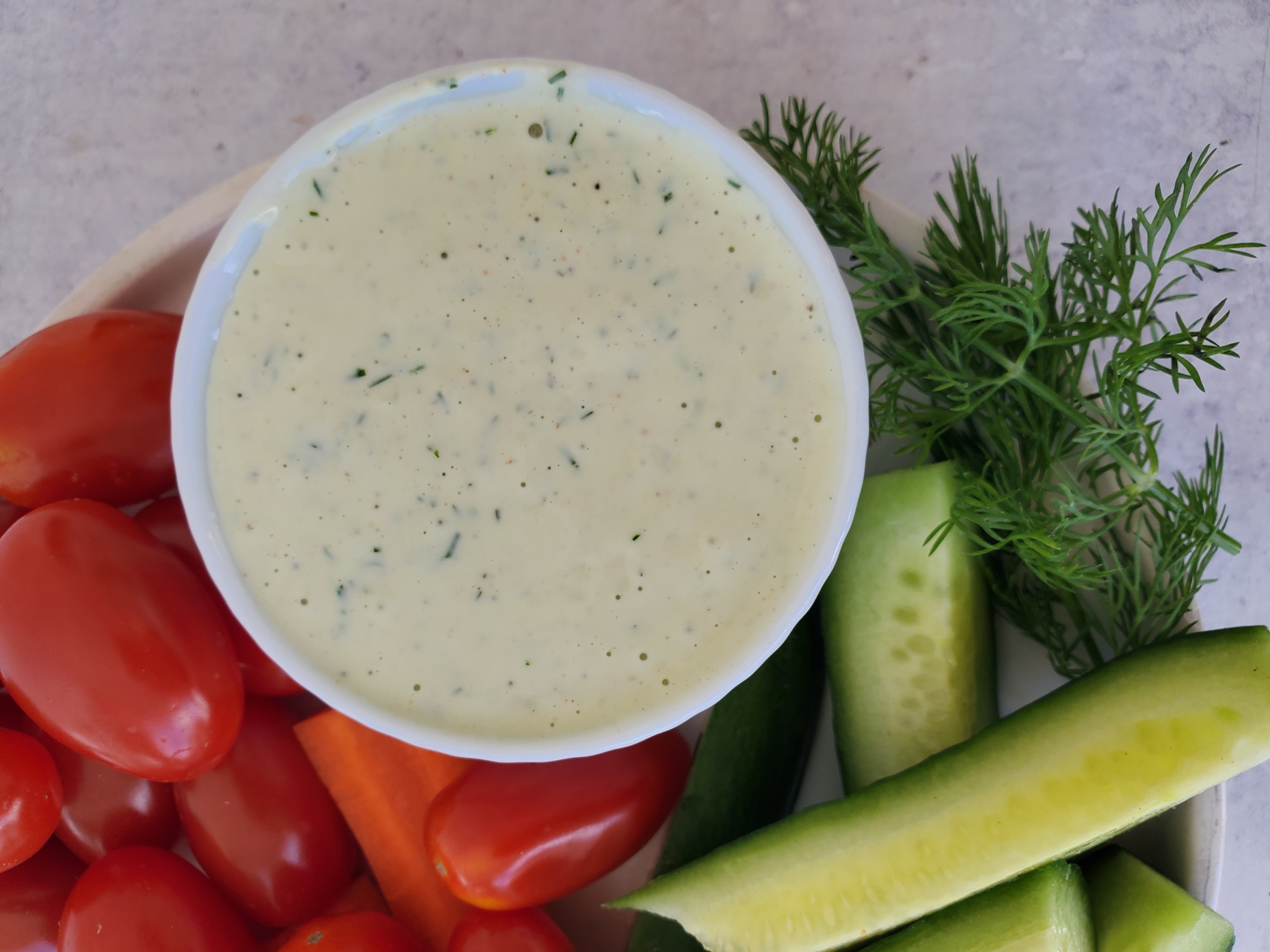 close-up of ranch dressing in a ramekin