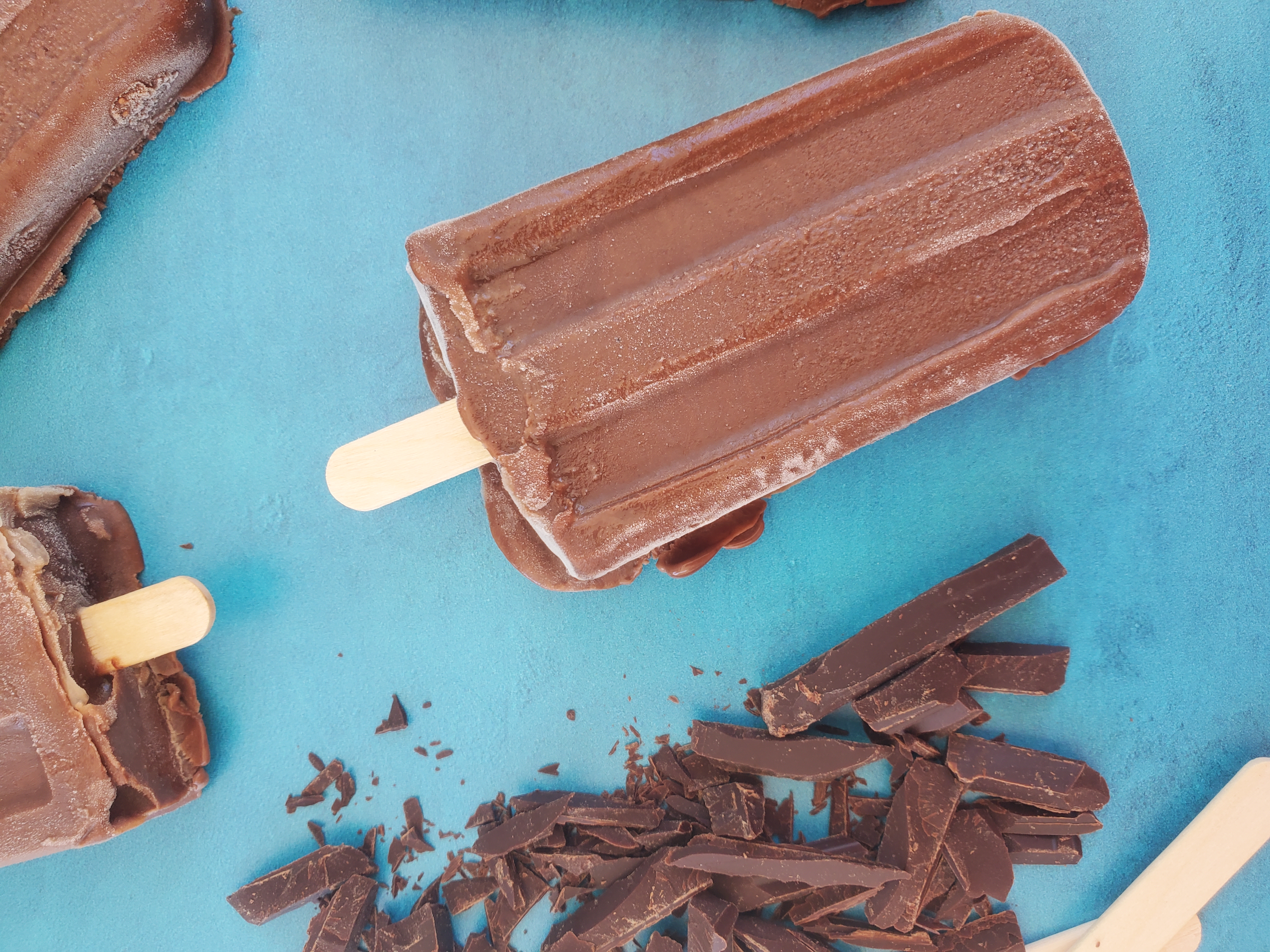 upside down fudge popsicle with chocolate next to it