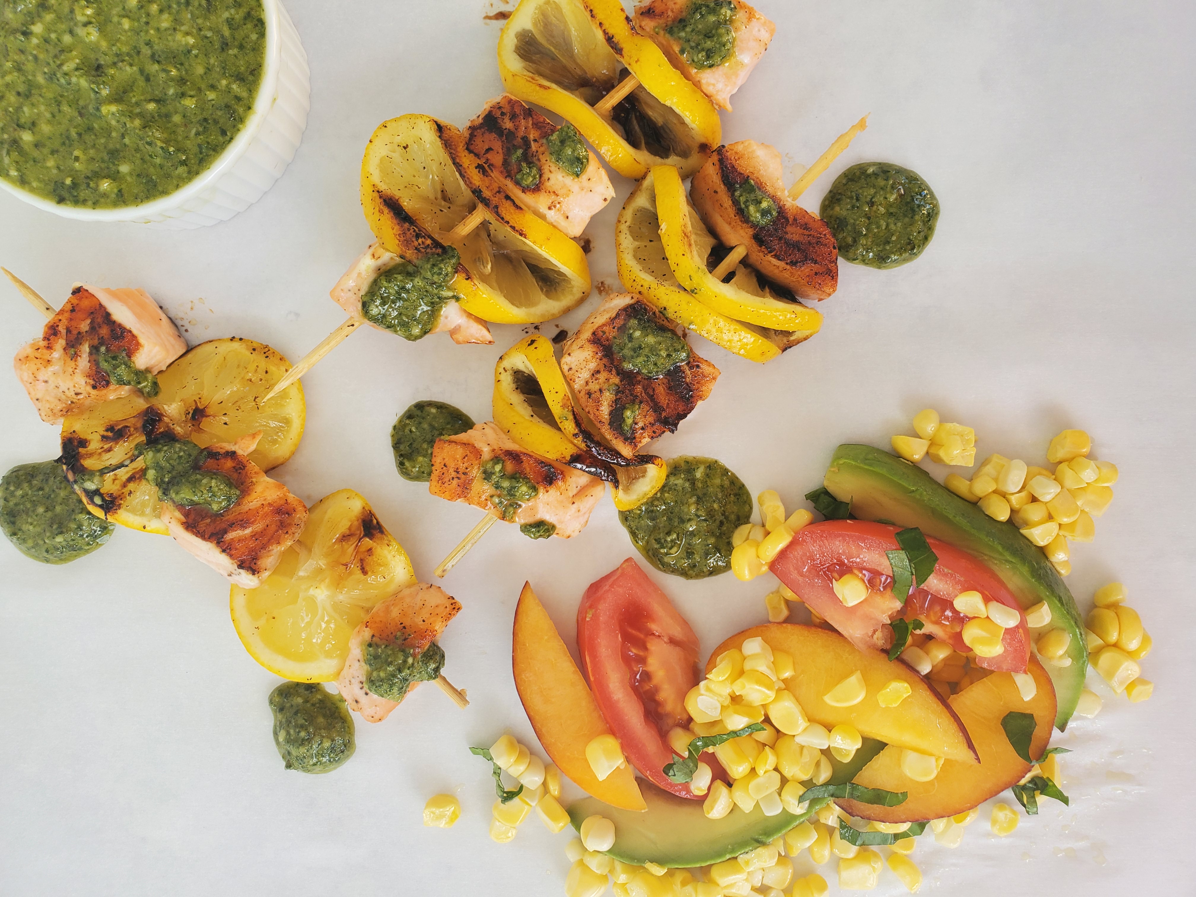 Salmon Pesto Skewers with corn tomato salad