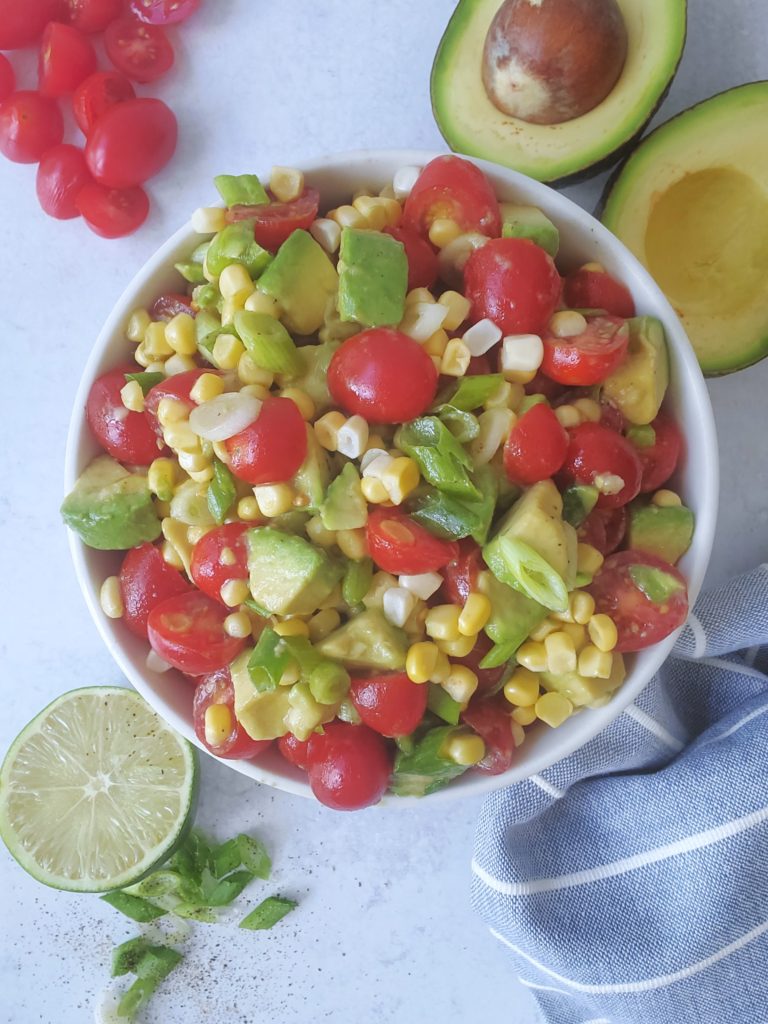 Tomato, Corn, & Avocado Salad in a bowl