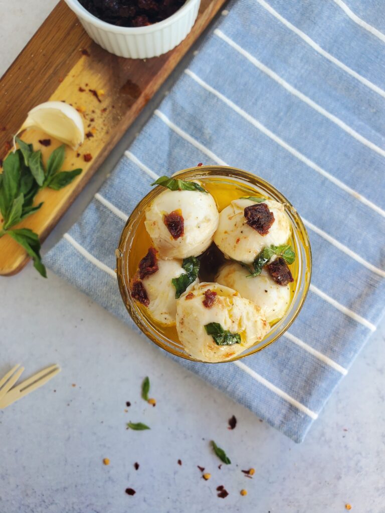 top shot of marinated mozzarella balls