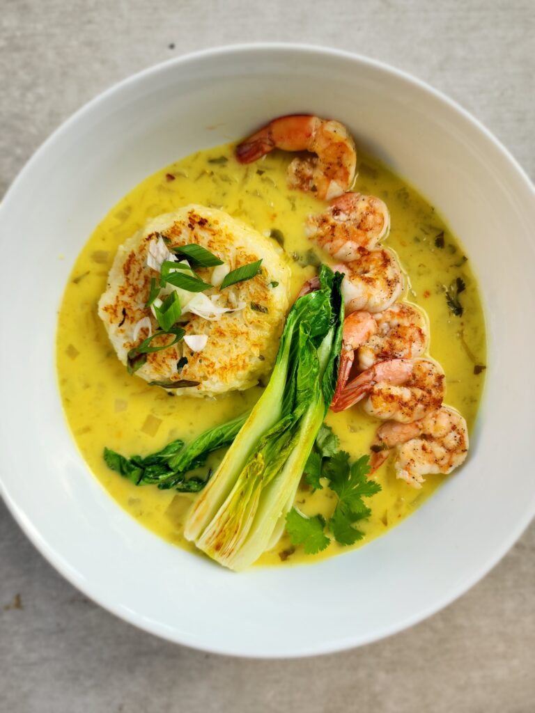 Bowl of Rice Cakes with seared shrimp and bok choy