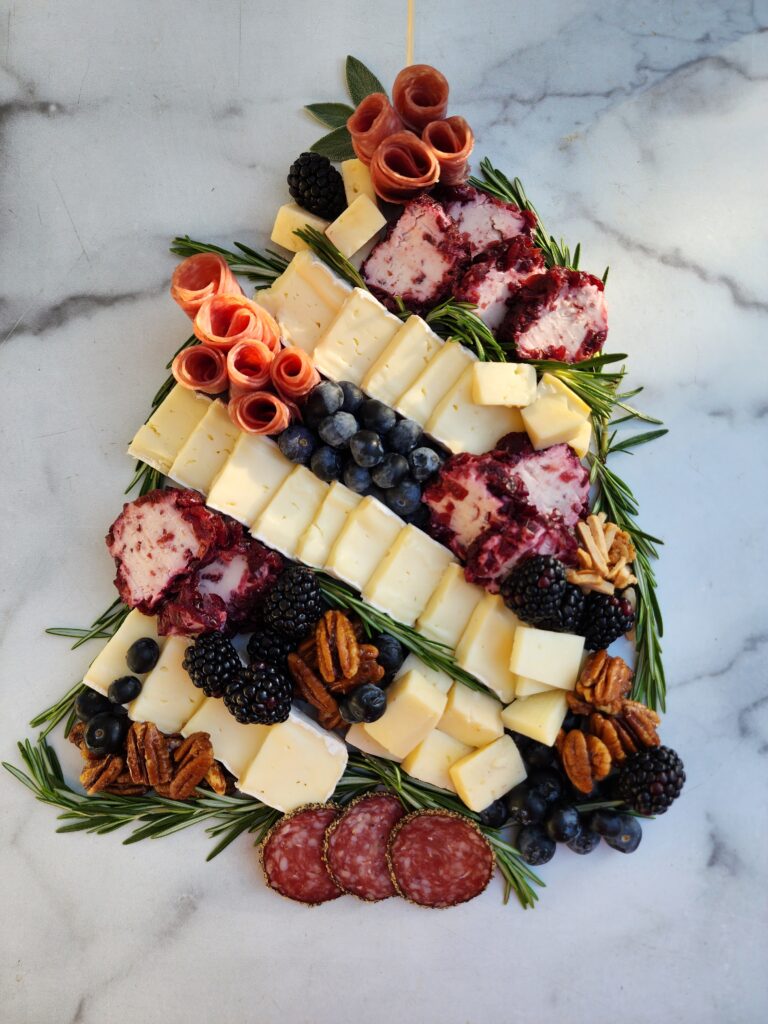 cheeseboard in the shape of a Christmas tree