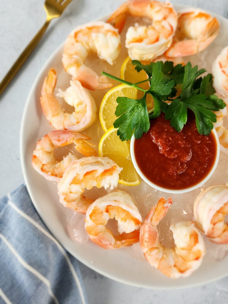 Plate of Easy Shrimp Cocktail with cocktail sauce