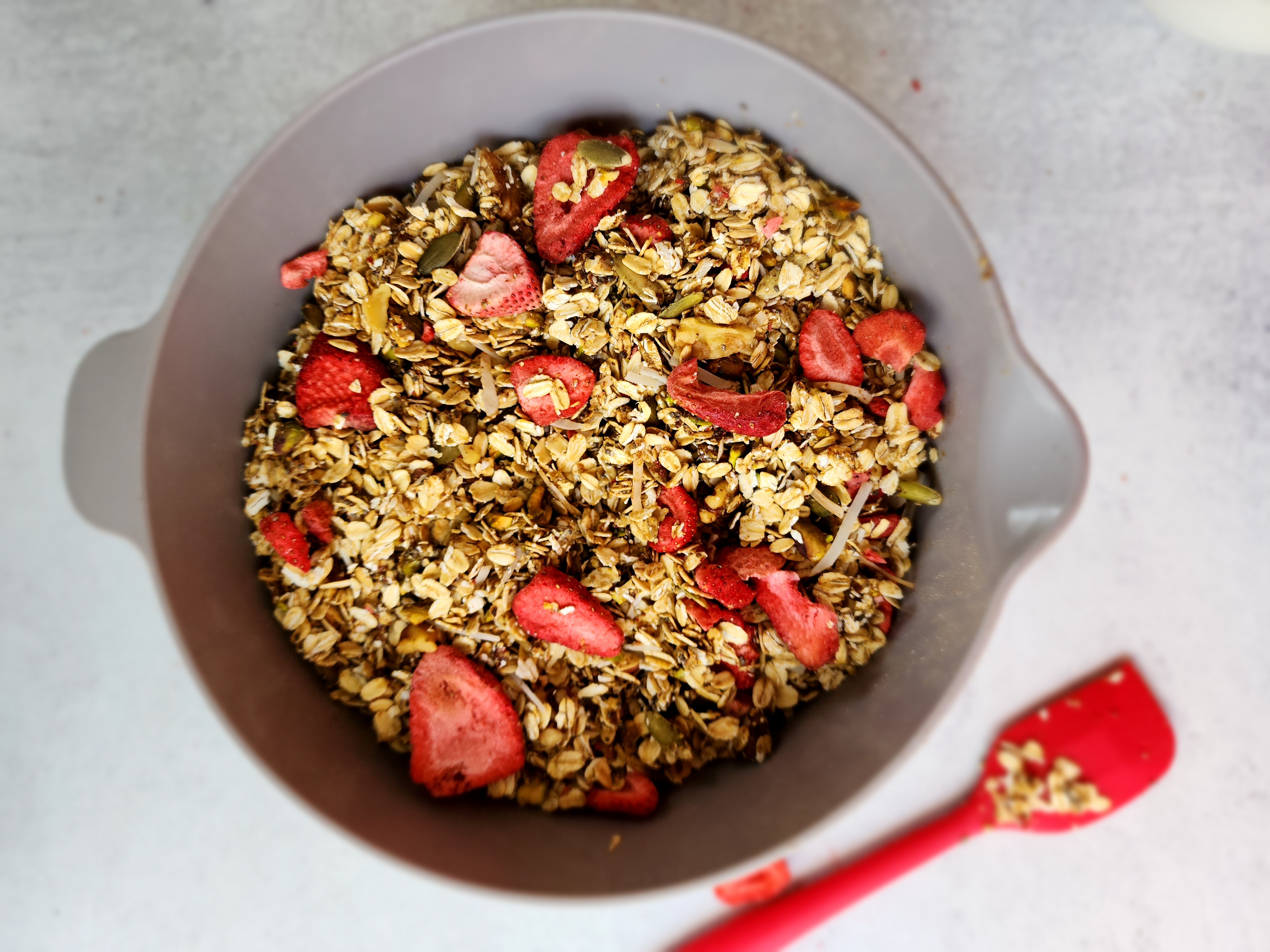 Bowl of ingredients for homemade muesli all mixed together