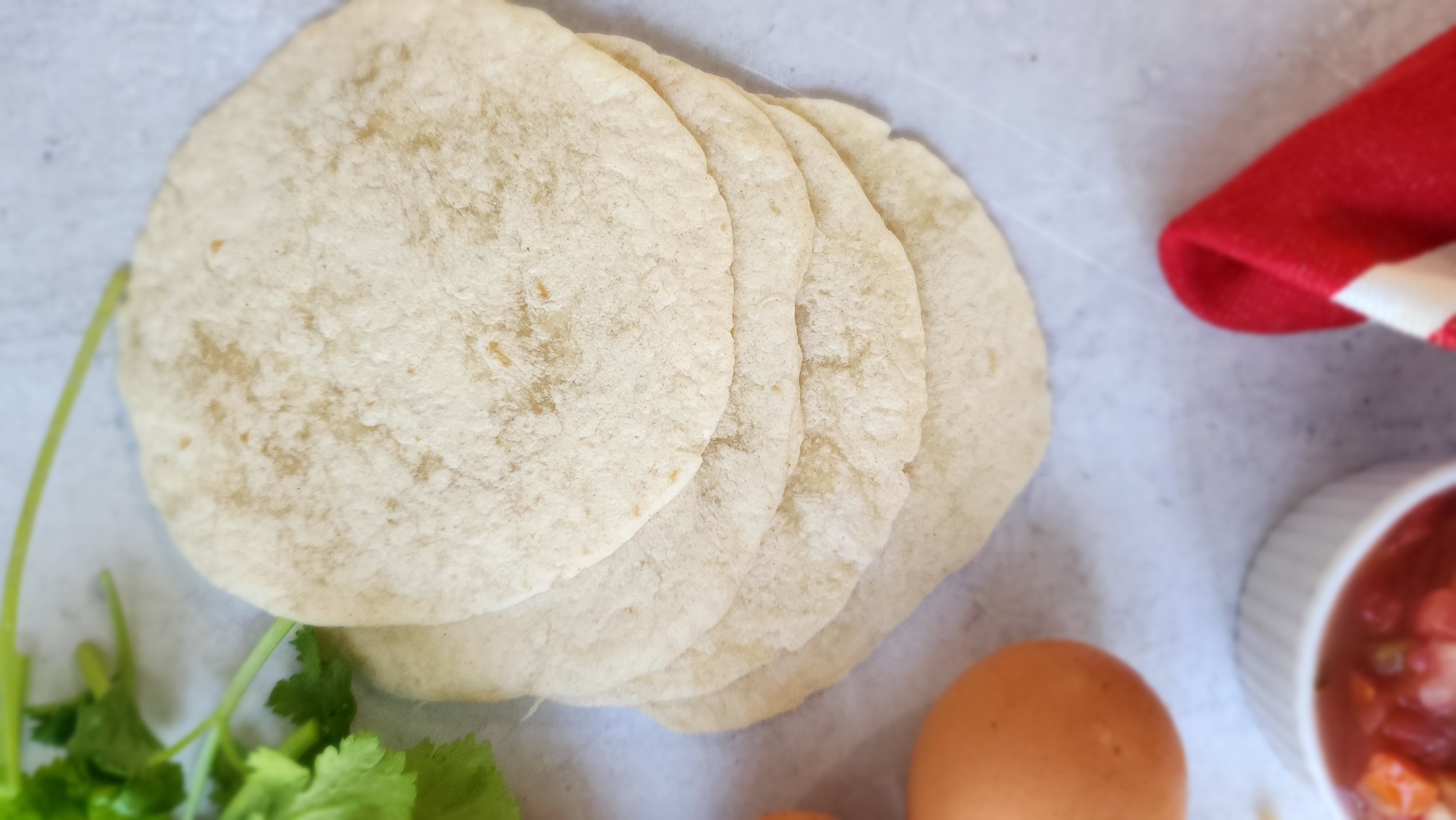 Close-up shot of tortillas for breakfast tacos