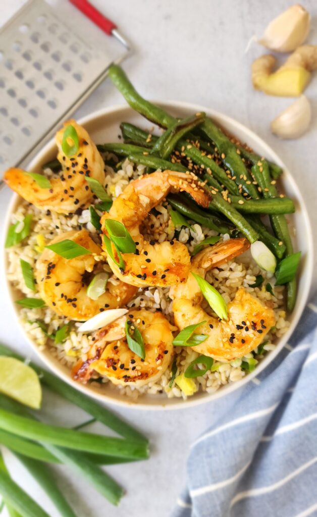 Hoisin Shrimp on a plate with ginger scallion rice and roasted green beans
