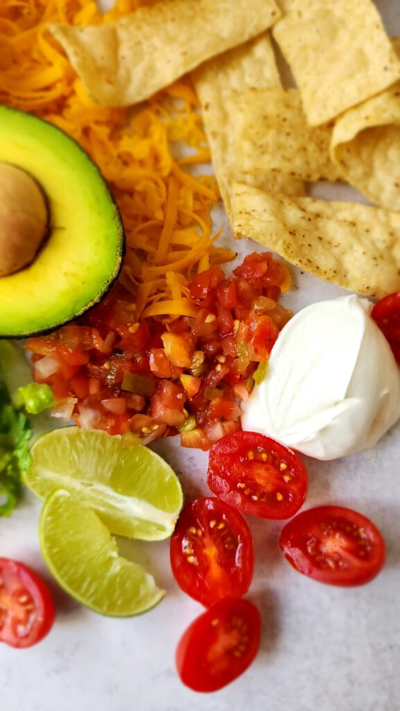 toppings for taco salad - but with a close-up of the pico de gallo