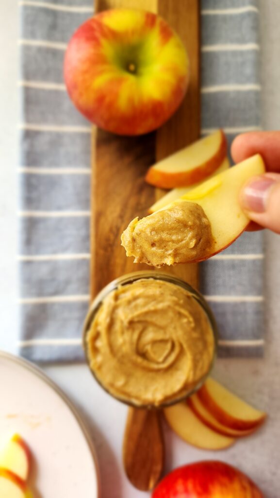 One single apple slice with date caramel