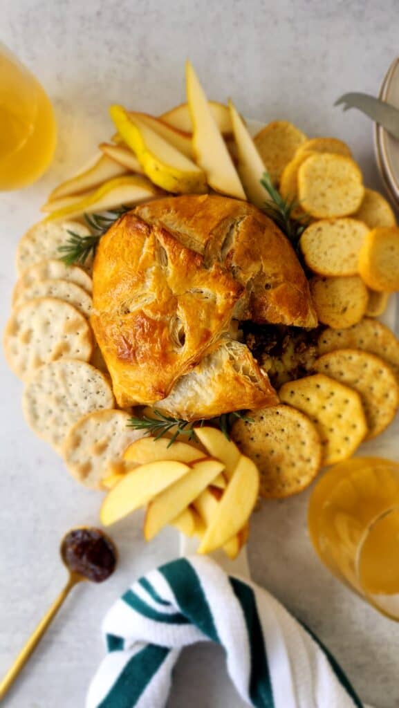 Baked Brie in Puff Pastry with fig jam, crackers, apple and pear slices