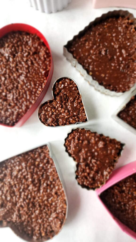 chocolate quinoa crunch in heart shaped cookie cutters