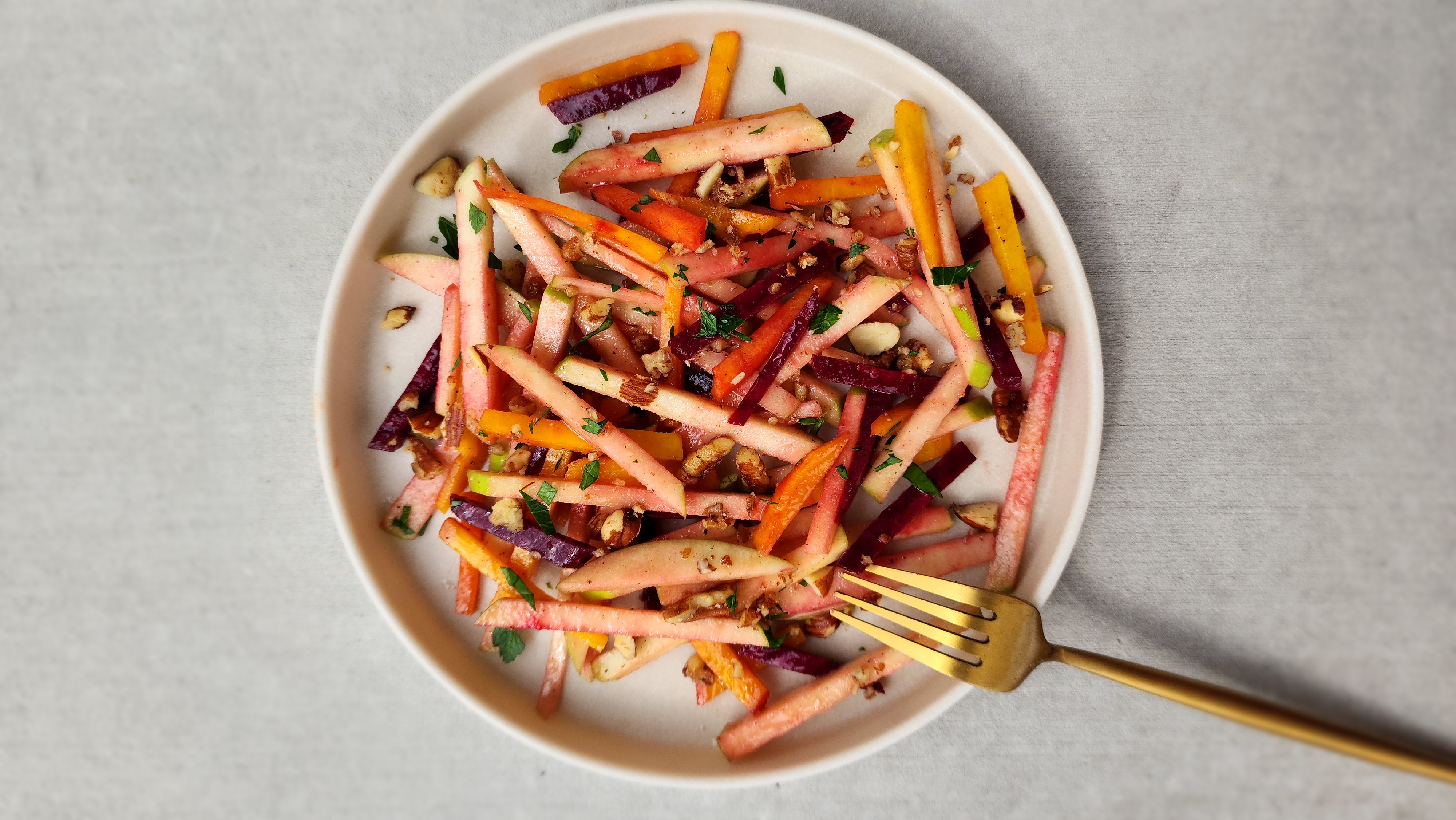 beet apple salad with a fork