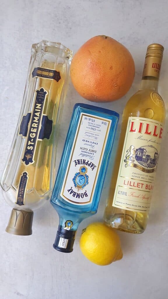 the French blonde cocktail ingredients: gin, Lillet Blanc, Elderflower, grapefruit, lemon