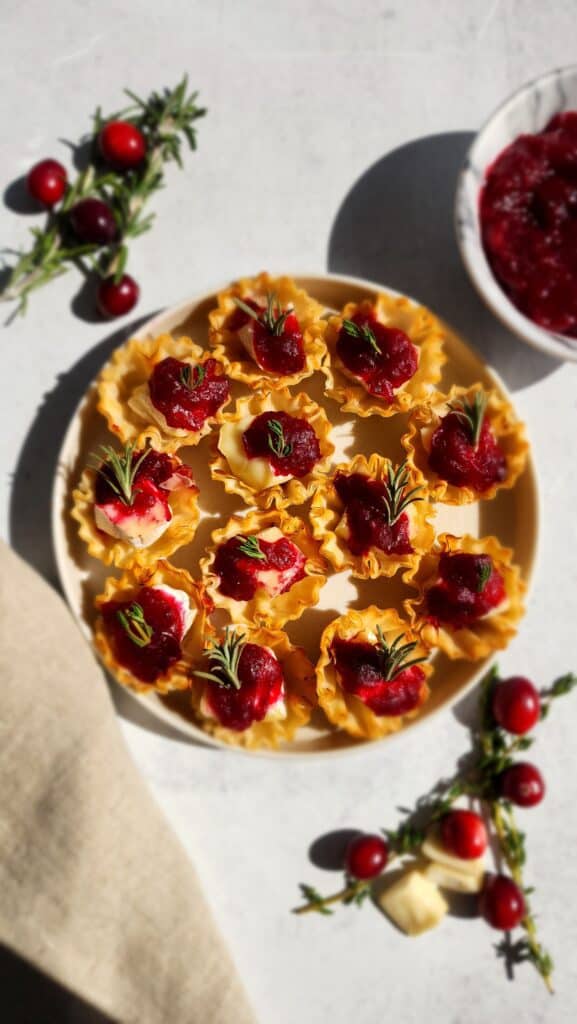 Plate full of cranberry brie bites