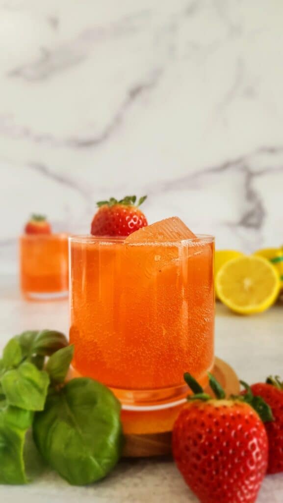 glass of a strawberry basil mocktail
