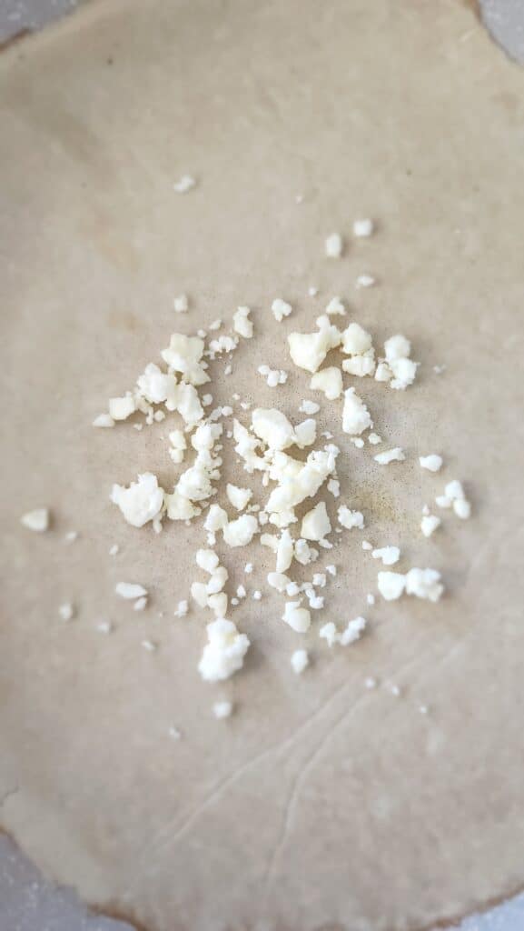 crepe with feta cheese sprinkled on top