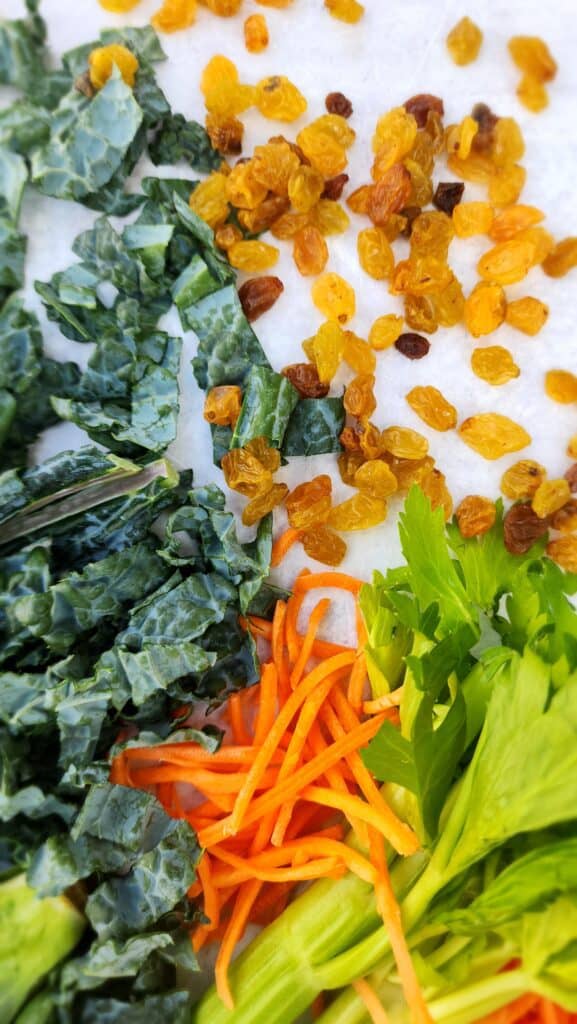 close up picture of golden raisins for kale brussels salad