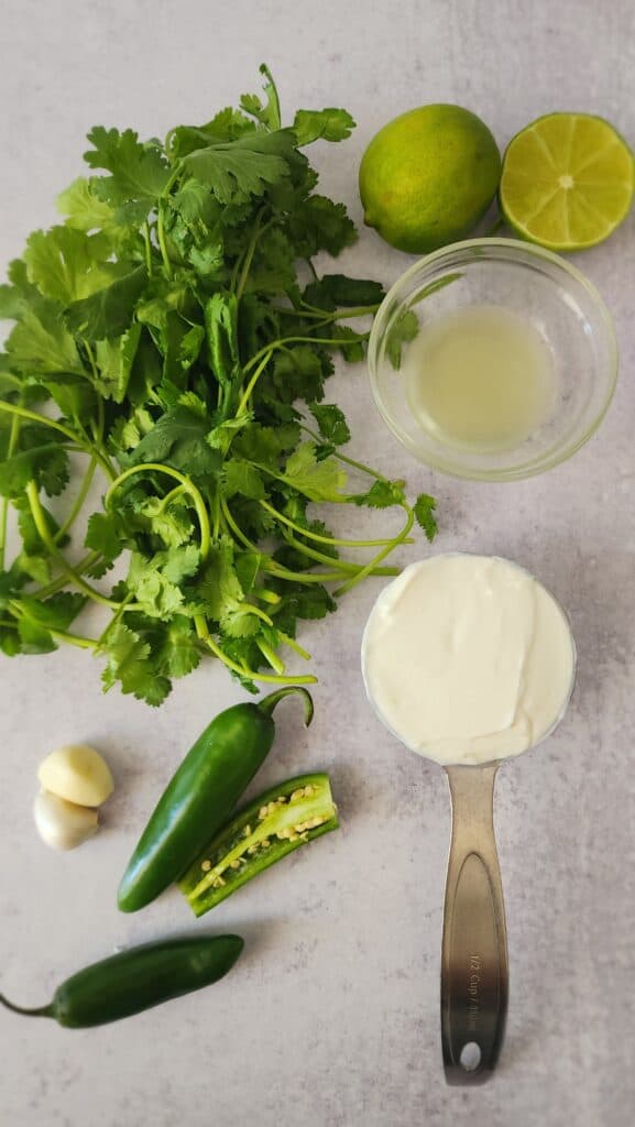 ingredients for cilantro jalapeño sauce: skyr, cilantro, jalapeño, lime juice, garlic