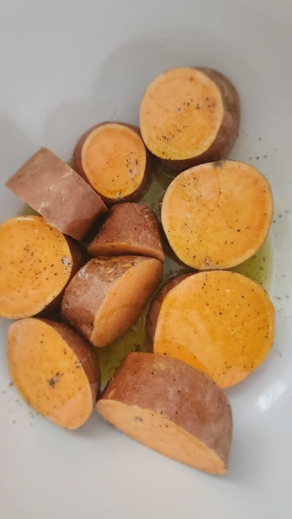 butter and olive oil mixture drizzled over the cut sweet potatoes for melting sweet potatoes