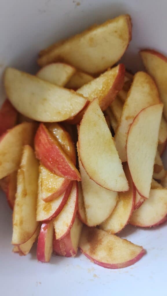 apple slices mixed with lemon juice, cinnamon, and brown sugar for puff pastry apple tart