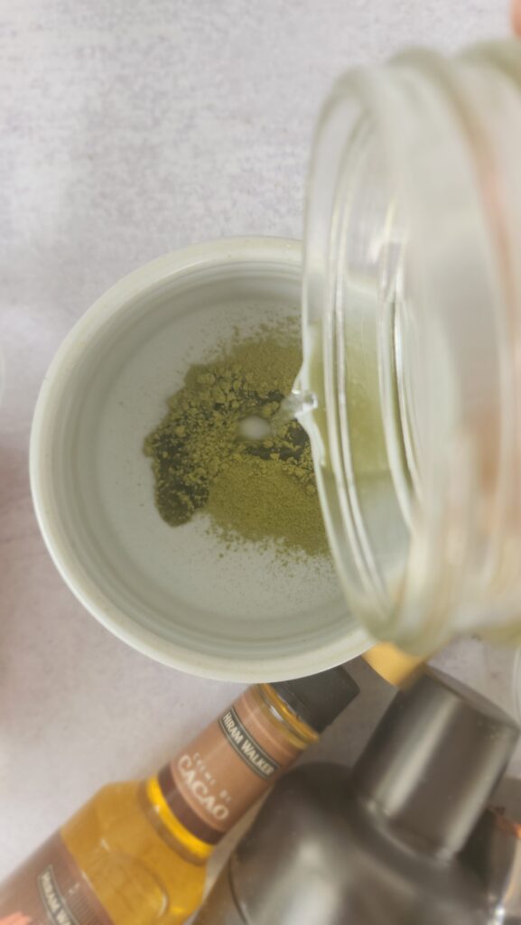 dissolving the matcha with hot water