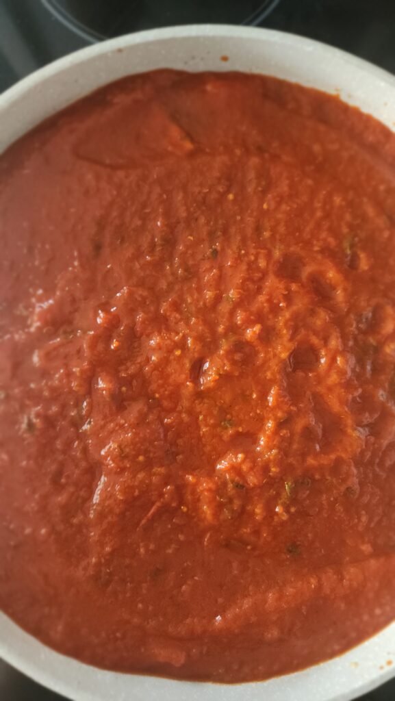 marinara sauce covering the no-boil noodles for skillet lasagna