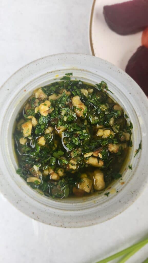 olive oil added in a ramekin for walnut gremolata