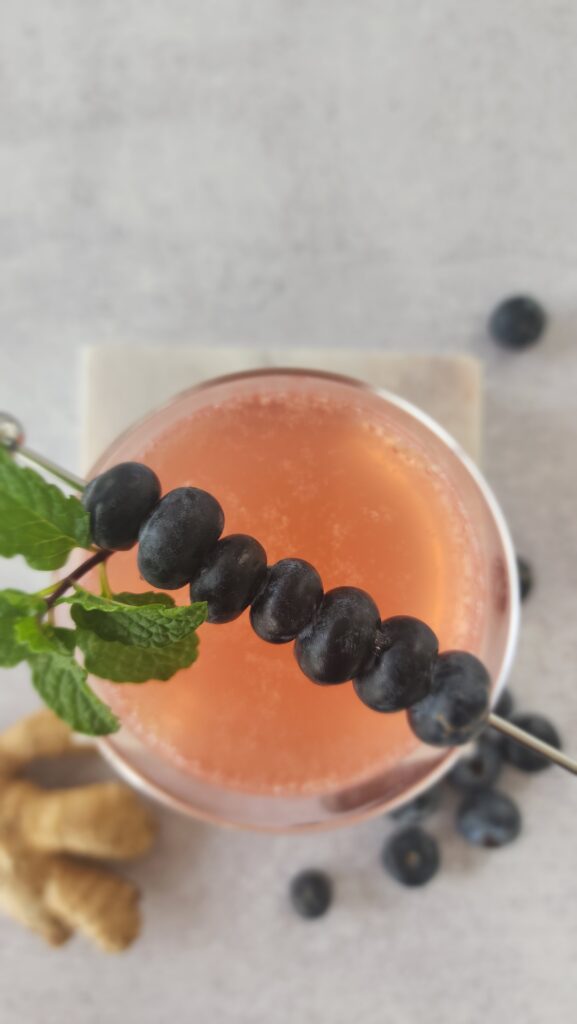 top shot of a blueberry ginger mocktail