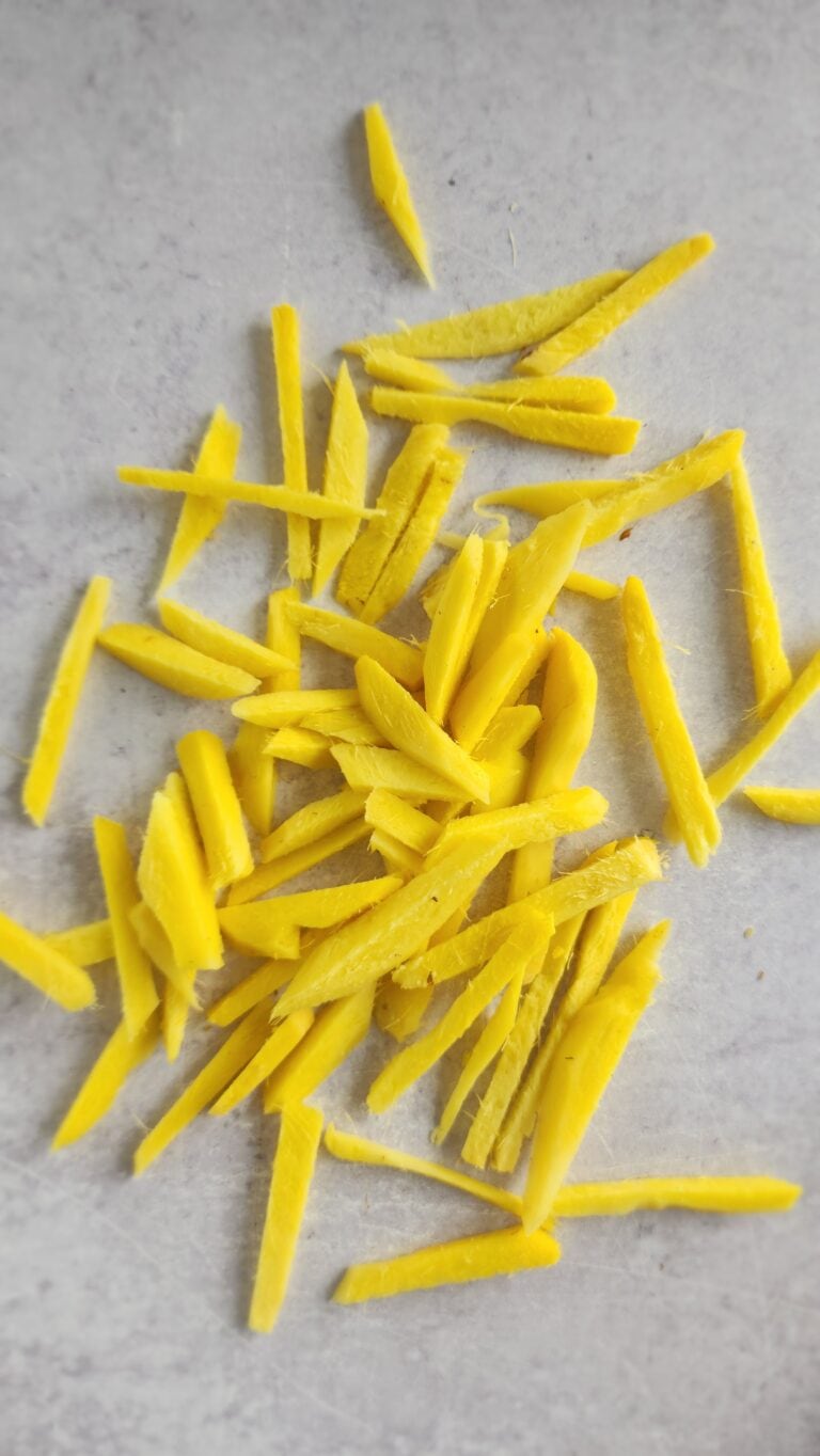 fresh ginger sliced in sticks for ginger simple syrup