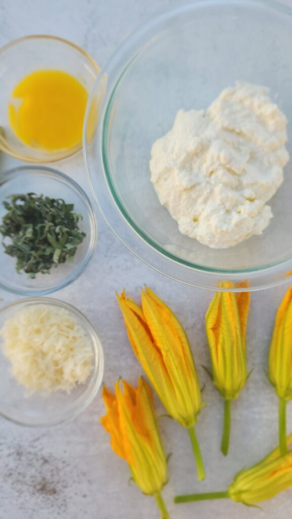 ingredients for stuffed squash blossoms: ricotta, sage, egg yolk, parmesan, black pepper