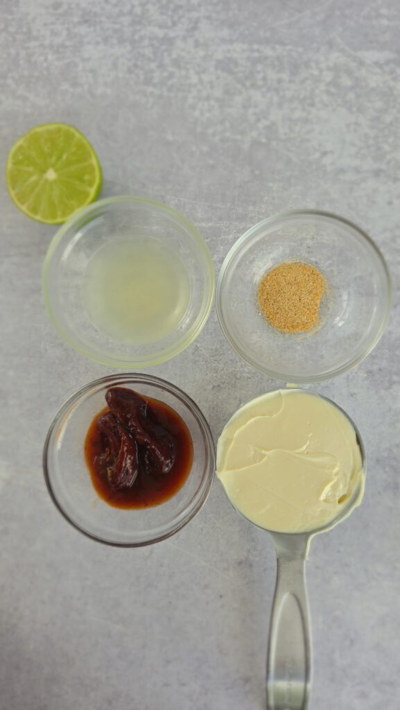 ingredients for chipotle mayo: chipotle peppers, mayonnaise, lime juice, garlic powder
