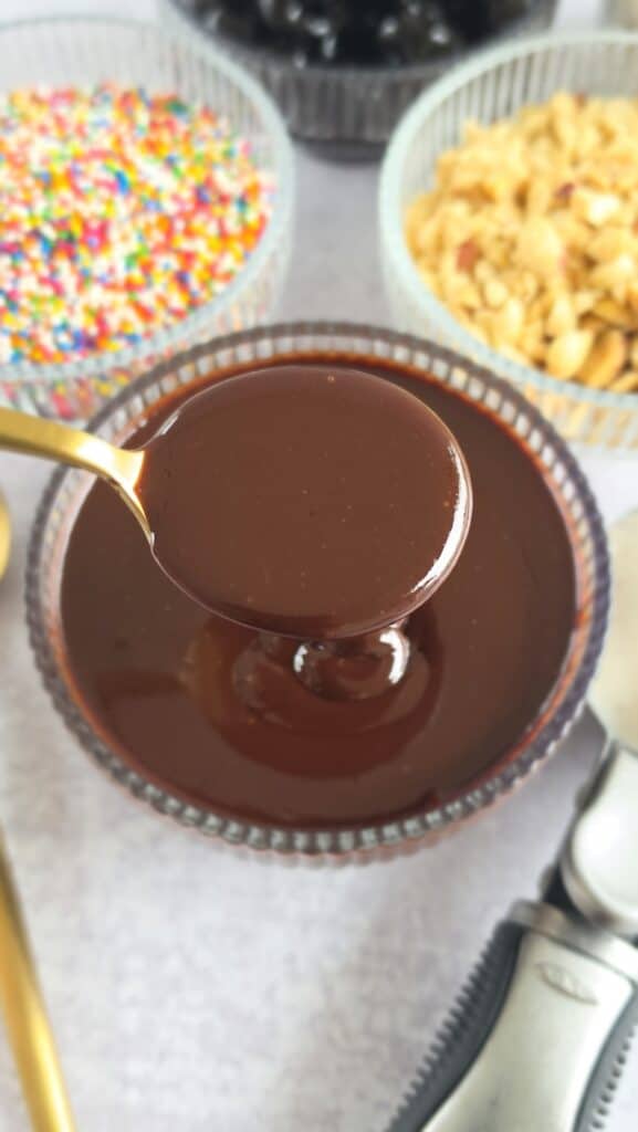 spoon shot of hot fudge sauce