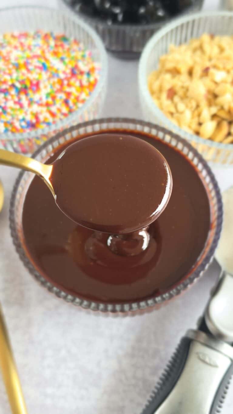 spoon shot of hot fudge sauce
