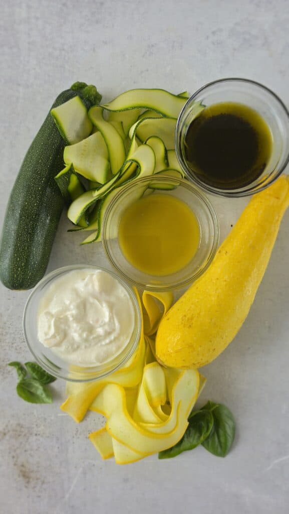 ingredients for summer squash ribbon salad with homemade ricotta and basil oil