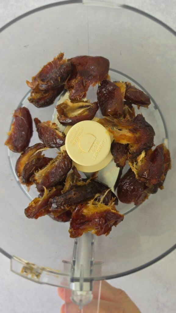 Medjool Dates for Date Caramel Turtles in a food processor bowl